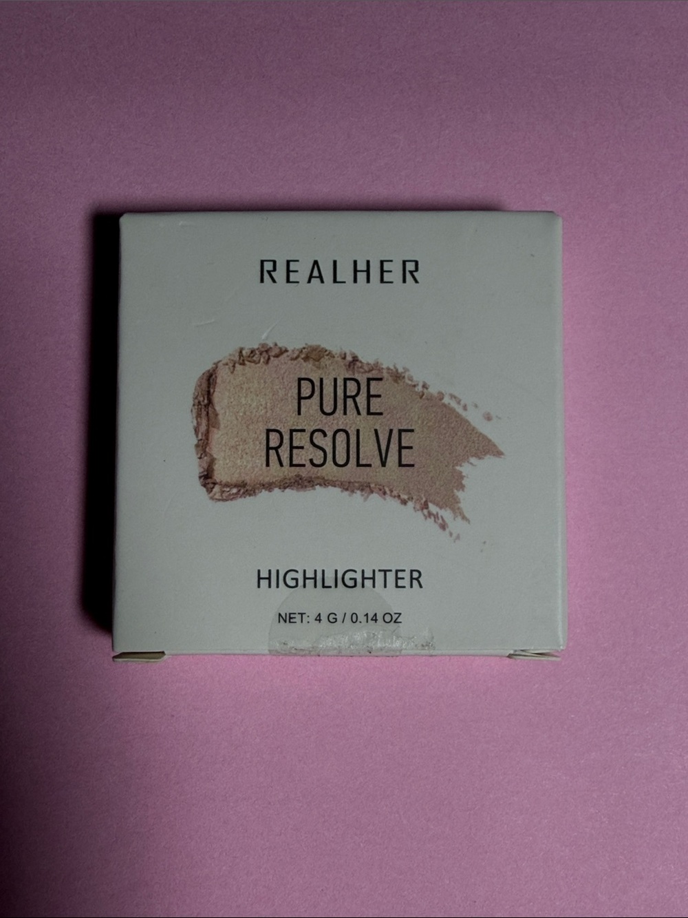 REALHER branded "Pure Resolve" highlighter in a 4-gram (0.14 oz) compact.